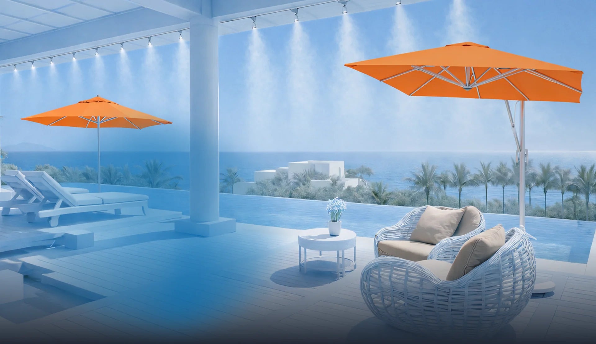 Outdoor patio with orange umbrellas, white furniture, and a view of the ocean.