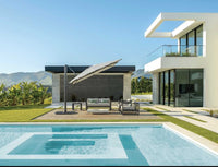 Modern house with pool and outdoor furniture on a sunny day