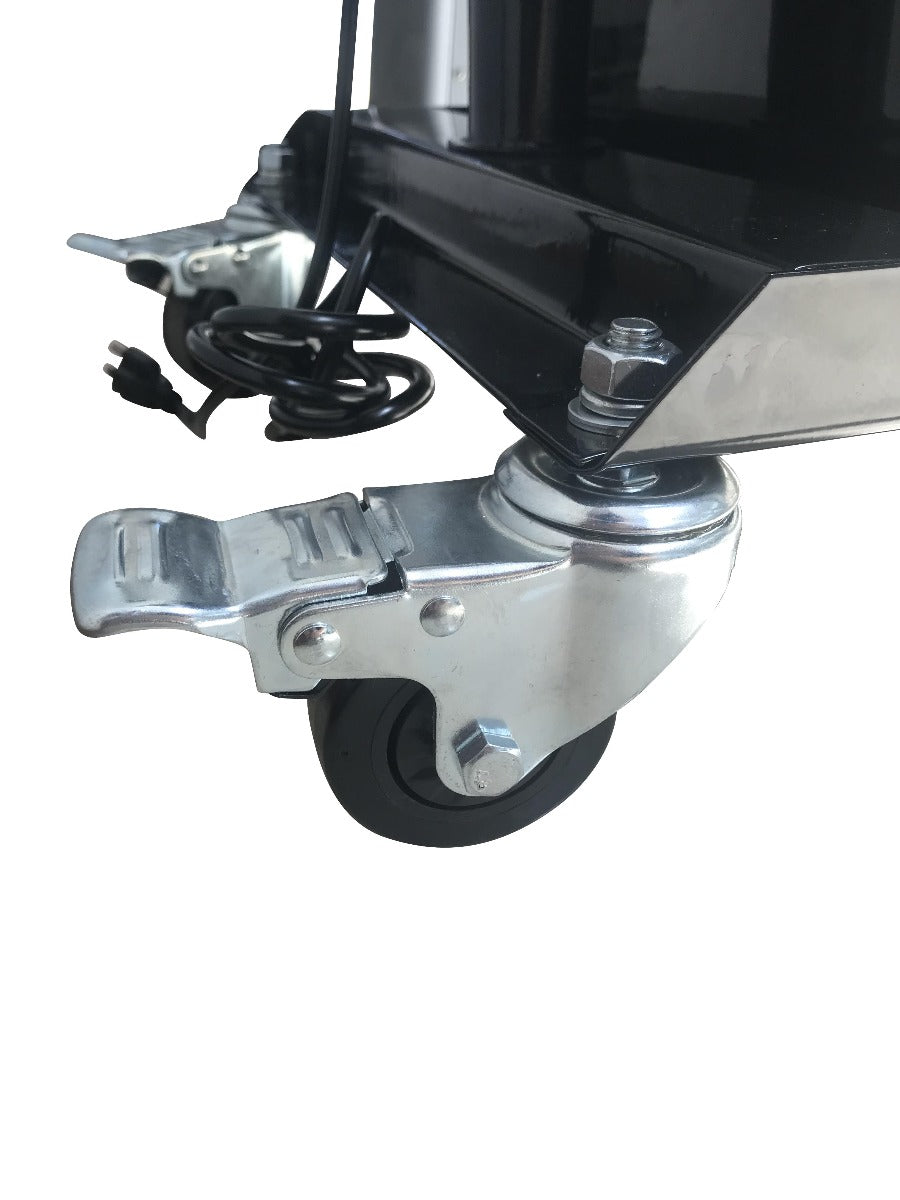 Close-up of a caster wheel with metal bracket and power cord on a white background