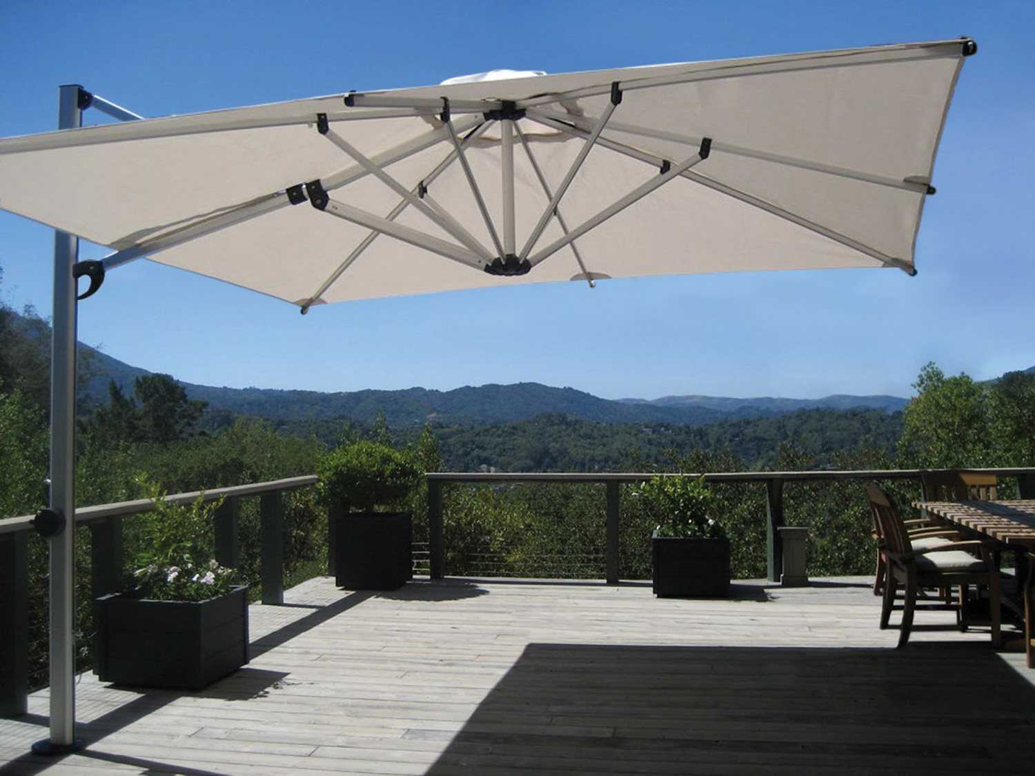 13 offset patio umbrella 10x13 ft large with base in case umbrella ribs and cord break when opening The umbrella should be lowered and secured in windy conditions or when not in use The base is best filled with sand or sand Shademaker Polaris 13' Square Crank